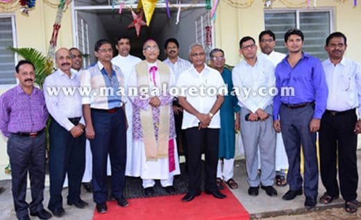 Bishop hands over 24 houses to needy