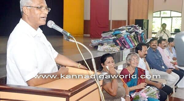 KORWA distributes school bags and books to needy students.